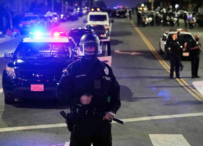 Members of the Los Angeles Police block access to Los Angeles Dodgers Stadium. AP