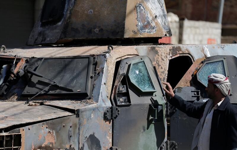 A man looks at an armored personnel carrier damaged during recent clashes between Houthi fighters and forces loyal to Yemen's former president Ali Abdullah Saleh in Sanaa, Yemen December 5, 2017. REUTERS/Khaled Abdullah