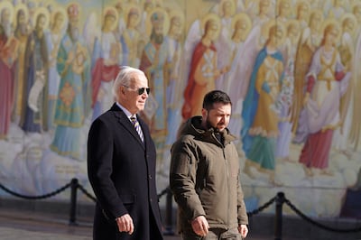 US President Joe Biden walks next to Ukrainian President Volodymyr Zelenskyy as he arrives for a visit in Kyiv on Monday. AFP 
