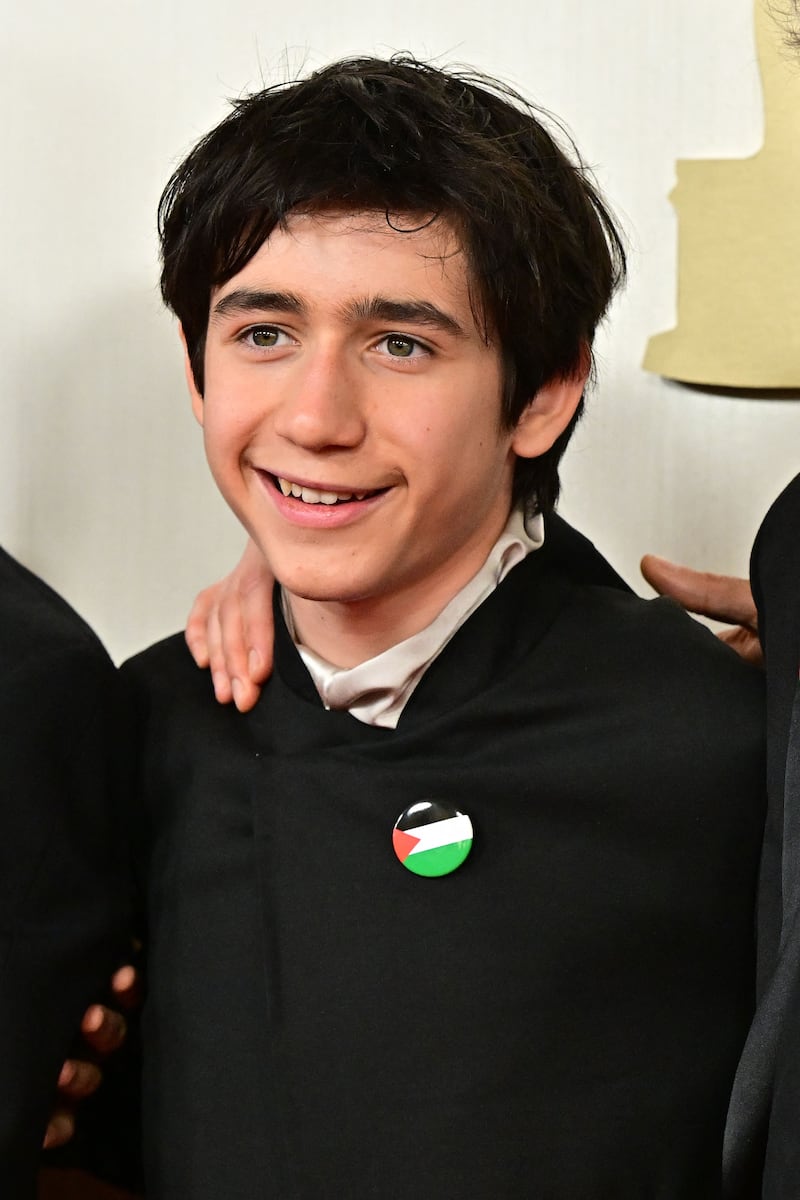 French actor Milo Machado-Graner wore a Palestinian flag pin during the ceremony. AFP