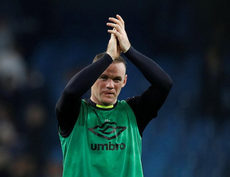 Everton's Wayne Rooney applauds fans before the Premier League match against Manchester City at the Etihad Stadium. Rooney scored his 200th Premier League goal as the game finished 1-1.  Phil Noble / Reuters