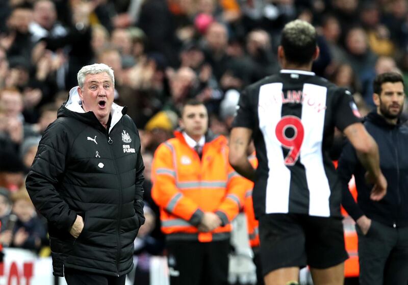 NEWCASTLE UPON TYNE, ENGLAND - JANUARY 14: Joelinton of Newcastle United celebrates after escores his team's fourth goal  with Manager Steve Bruce during the FA Cup Third Round Replay match between Newcastle United and Rochdale at St. James Park on January 14, 2020 in Newcastle upon Tyne, England. (Photo by Ian MacNicol/Getty Images)