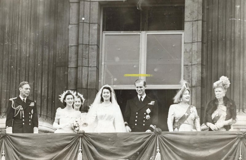 Members of the British royal family on the balcony at Buckingham Palace after the wedding of Princess Elizabeth and Philip Mountbatten (later Queen Elizabeth II and Prince Philip, Duke of Edinburgh), London, 20th November 1947. Left to right: King George VI, Princess Margaret, Lady Mary Cambridge, Elizabeth, Philip, Queen Elizabeth (later Queen Mother) and Queen Mary. (Photo by Evening Standard/Hulton Archive/Getty Images)