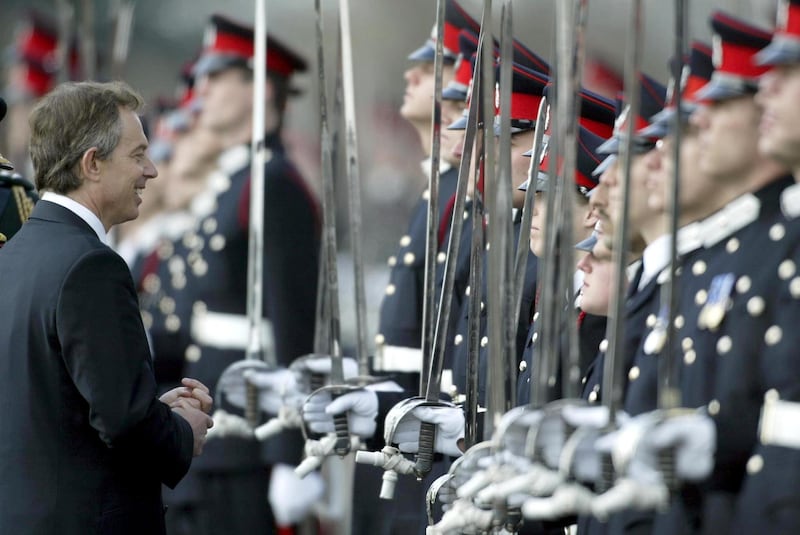 CAMBERLEY, ENGLAND - APRIL 11:  British Prime Minister Tony Blair inspects Officer cadets after they completed their training at the Royal Military Academy Sandhurst April 11, 2003 in Camberley. Some 409 cadets took part in the event and it is the first time ever a serving Labour Prime Minister took the inspection and salute.     (Photo by Julian Herbert/Getty Images)  