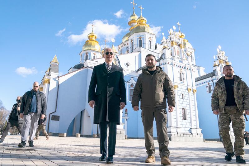 Volodymyr Zelenskyy with US President Joe Biden at St Michael's Golden-Domed Cathedral in Kyiv during Mr Biden's surprise visit, on February 20. AP