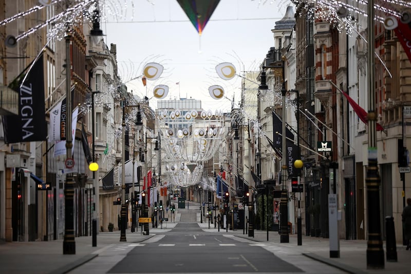 A view of a quiet New Bond Street in London. Some 24 million people in England, more than 40 per cent of the population have gone into tier four, England's highest Covid level - which includes a 'stay at home' order. Reuters