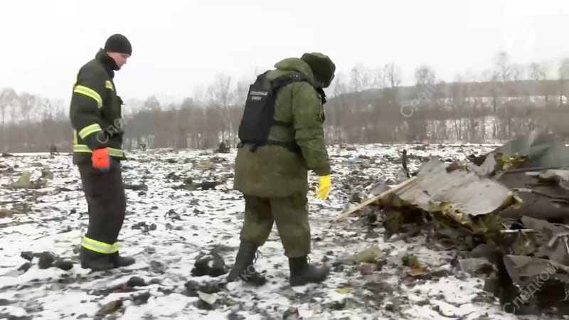 Investigators at the Ilyushin Il-72 crash site in the Belgorod region of western Russia. Reuters