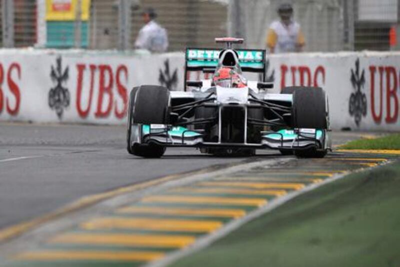 Mercedes driver Michael Schumacher of Germany goes wide on turn five during the first practice session of the Australian Formula One Grand Prix at Albert Park in Melbourne, Australia, Friday, March 16, 2012. (AP Photo/Rob Griffith)