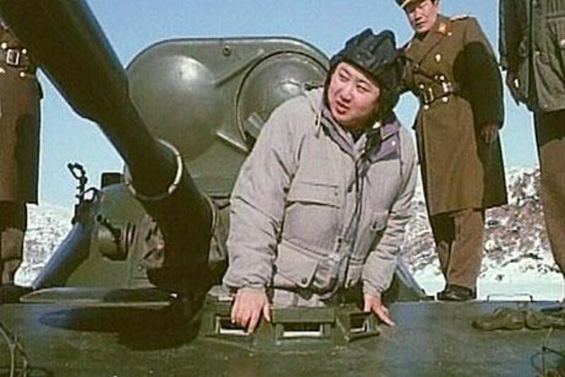 Kim Jong-un, the new leader of North Korea, inspects a tank in this still image from a released documentary of the 'Supreme Leader' by North Korea's state television station.