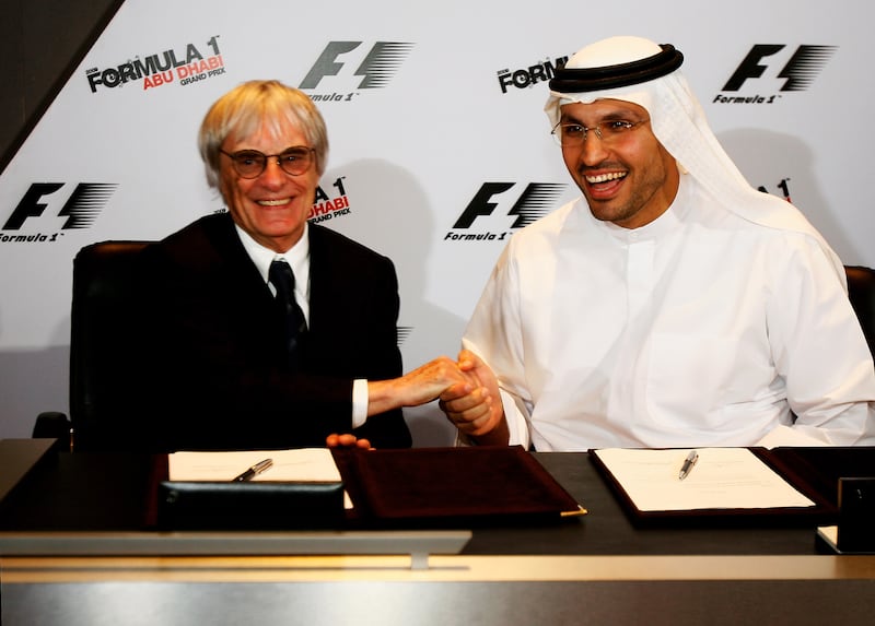 Chairman of Abu Dhabi Executive Affairs Khaldoon Al Mubarak and Formula One boss Bernie Ecclestone in 2007 sign the deal that led to the city hosting its first Formula One race in 2009. Getty Images