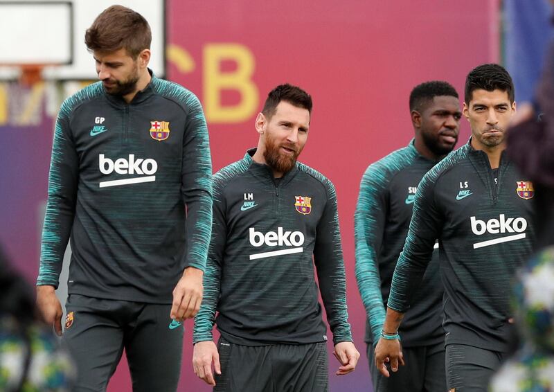 Barcelona's Gerard Pique, Lionel Messi, Samuel Umtiti and Luis Suarez during training. Reuters