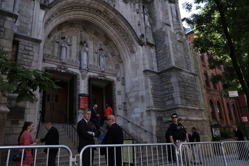 Security guards outside St Vincent Ferrer Church for the funeral for Ivana Trump. Reuters