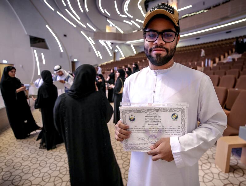Saeed Alkindi with his certificates at the UAE Industrialist Career Fair