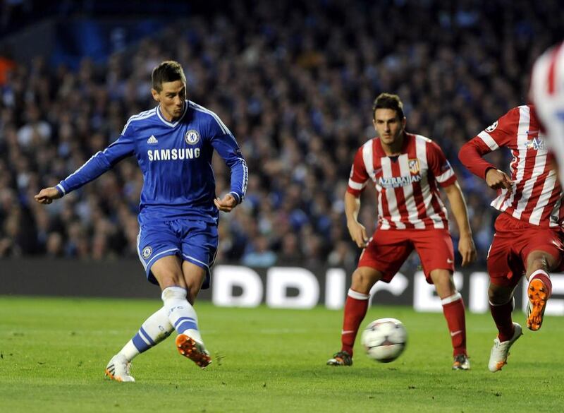 Chelsea striker Fernando Torres scores the first goal during the Champions League semi-final second leg against Atletico Madrid on Wednesday. Gerry Penny / EPA / April 30, 2014
