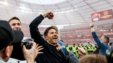 Leverkusen's head coach Xabi Alonso celebrates winning the German Bundesliga championship after the German Bundesliga soccer match between Bayer 04 Leverkusen and SV Werder Bremen in Leverkusen, Germany, 14 April 2024.   EPA/CHRISTOPHER NEUNDORF CONDITIONS - ATTENTION: The DFL regulations prohibit any use of photographs as image sequences and/or quasi-video. 