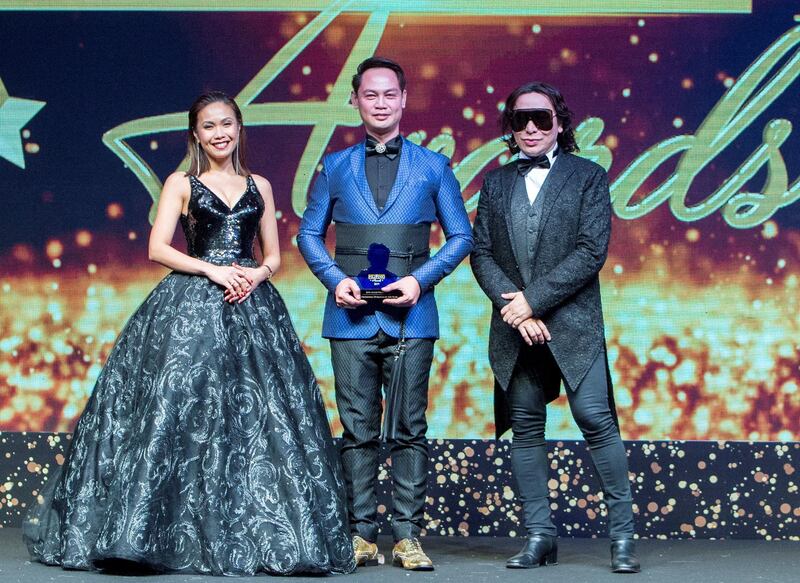 Dubai, United Arab Emirates- Jose Allen Villena  winner Most Promising Designer of the Year Individual Category awarded by Karen Remo and fashion designer Michael Cinco at the Filipino Times award at Sofitel at The Palm.  Ruel Pableo for The National