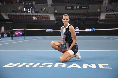 BRISBANE, AUSTRALIA - JANUARY 12: Karolina Pliskova of The Czech Republic holds the winners trophy after the finals match against Madison Keys of the USA during day seven of the 2020 Brisbane International at Pat Rafter Arena on January 12, 2020 in Brisbane, Australia. (Photo by Chris Hyde/Getty Images)