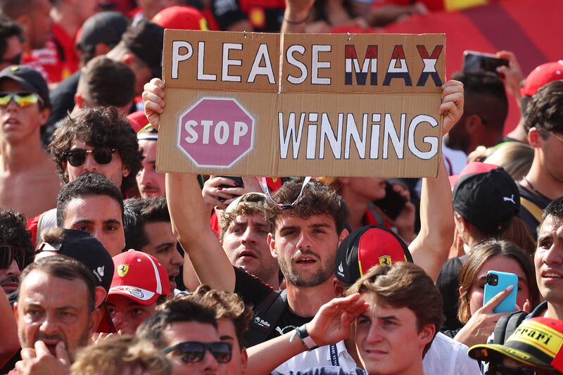A spectator holds up a sign before the Italian Grand Prix. Getty 