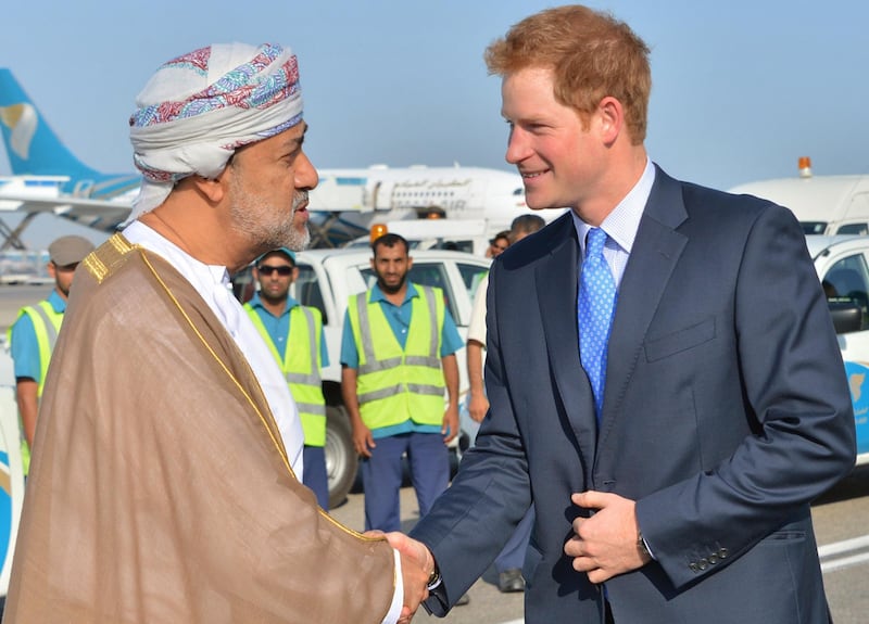 A handout image made available by Oman News Agency (ONA) shows Britain's Prince Harry being welcomed by Omani Minister of Culture and Heritage Sayyid Haitham Bin Tariq Al Said, upon his arrival in Oman, on November 18 2014. AFP PHOTO/HO/ONA == RESTRICTED TO EDITORIAL USE - MANDATORY CREDIT "AFP PHOTO/HO/OMAN NEWS AGENCY (ONA)" NO MARKETING NO ADVERTISING CAMPAIGNS - DISTRIBUTED AS A SERVICE TO CLIENTS== (Photo by - / ONA / AFP)