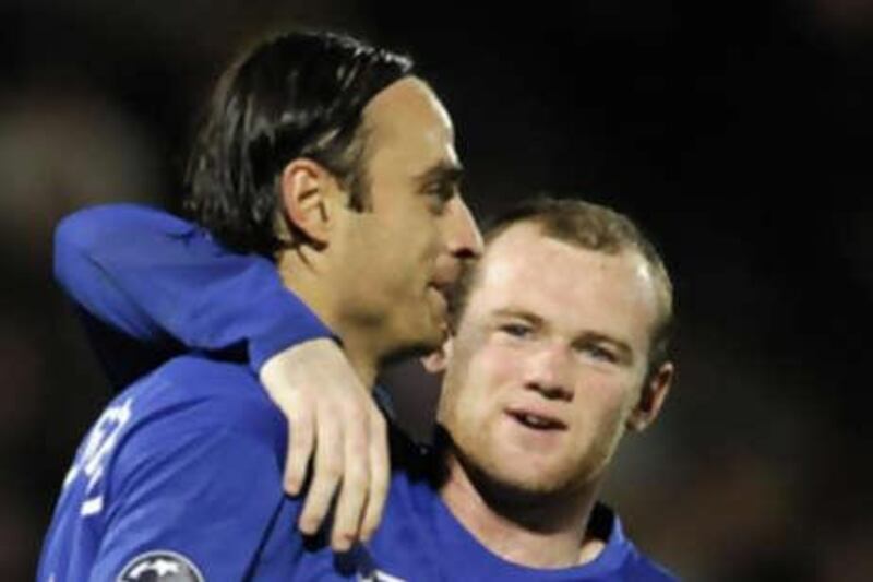 The goalscorers for Manchester United against Aalborg, Dimitar Berbatov, left, and Wayne Rooney, formed a good understanding up front against their Danish opponents.