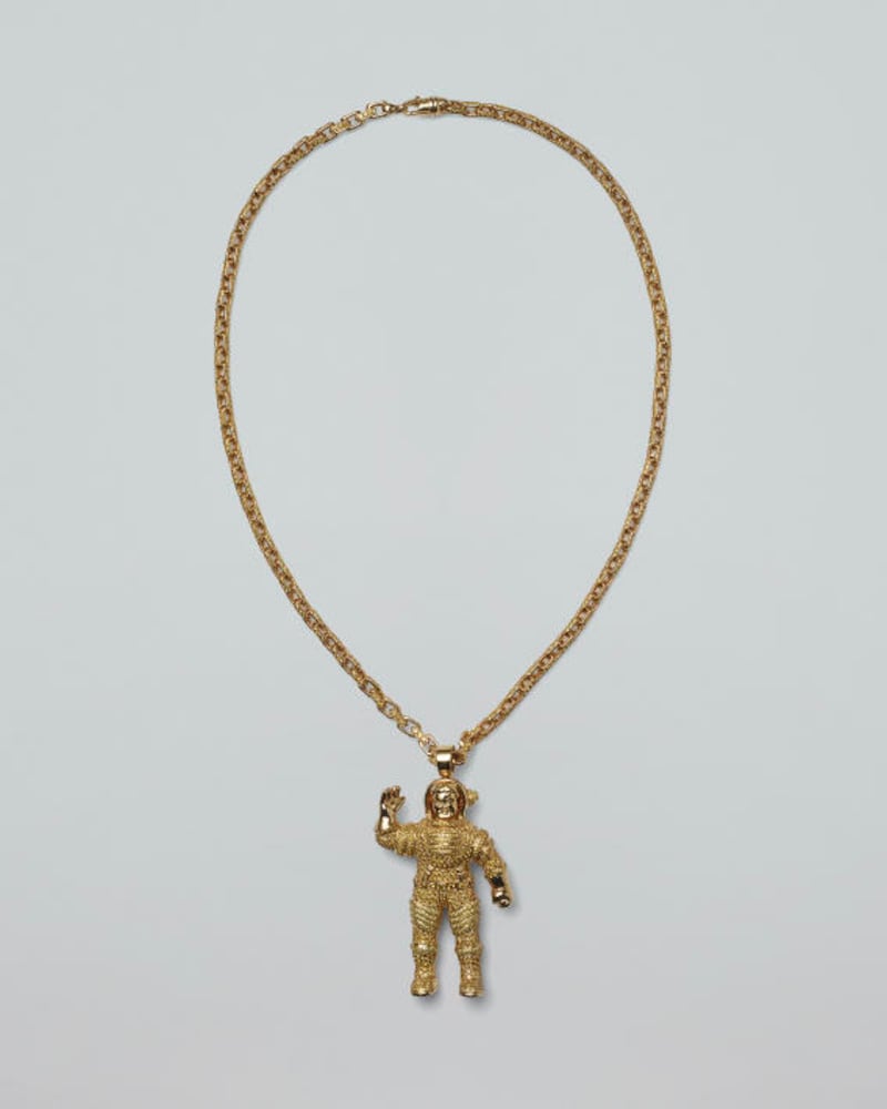 Made by Jacob & Co in 2004, Williams wore this one-of-a-kind Astronaut Pendant in yellow gold and 1,800 brilliant cut diamonds to attend the spring 2005 haute couture show by Versace. Estimated value $65,000-$95,000. 