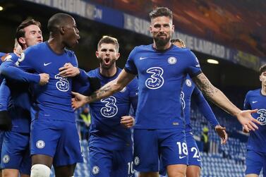 Chelsea's Kurt Zouma, second from left, and Olivier Giroud, centre right, celebrate. AP