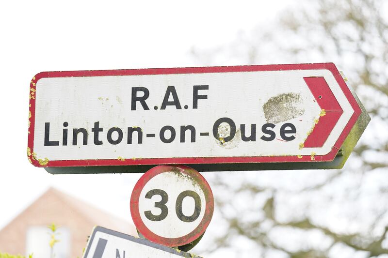 The UK plans to place more than 1,500 asylum seekers at a former RAF base in a rural village while their claims are processed. PA