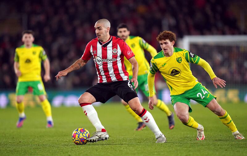 Southampton's Oriol Romeu and Norwich City's Josh Sargent, right, battle for the ball. AP