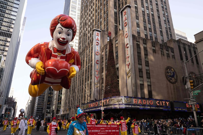 The Ronald McDonald balloon floats past Radio City Music Hall. AFP