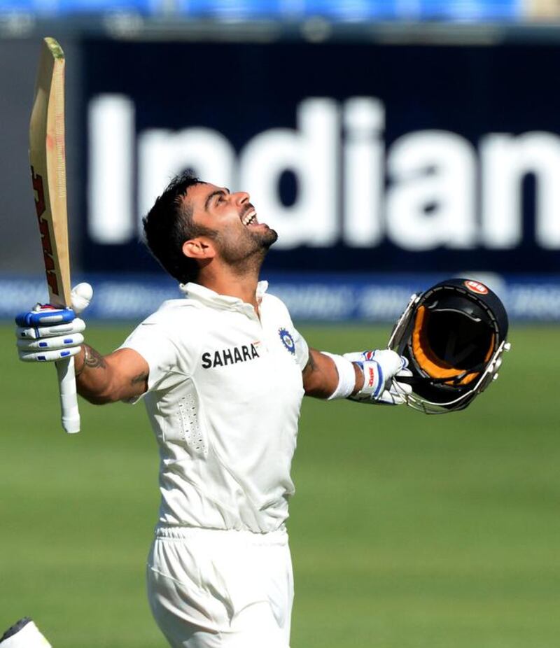 Virat Kohli of India celebrates his 100 runs during day 1 of the first Test match against South Africa at Bidvest Wanderers Stadium on Friday. Duif du Toit / Getty Images