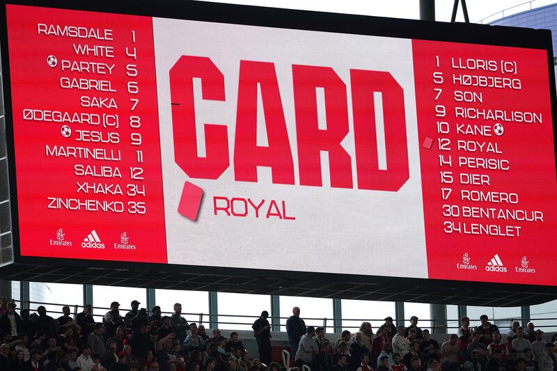 The big screen displays the red card given to Tottenham Hotspur's Emerson Royal. PA
