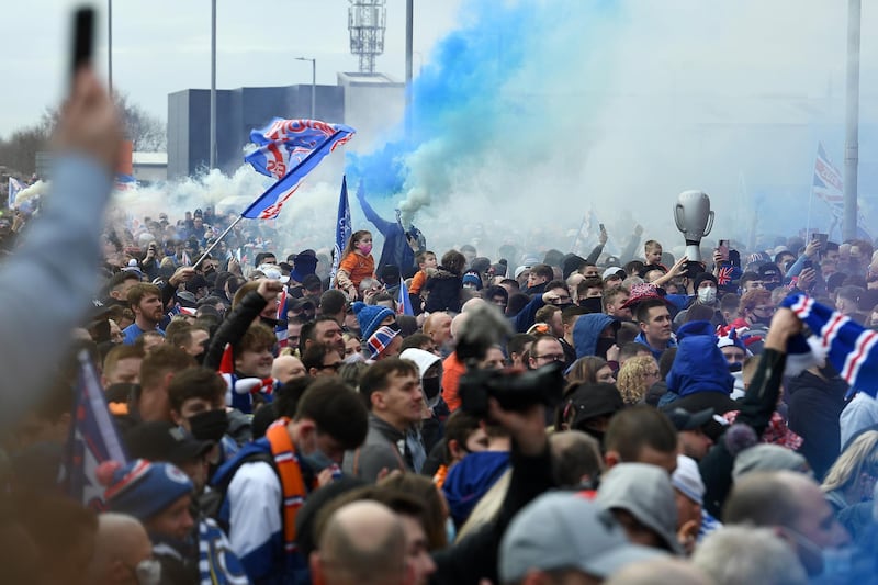 Rangers fans gather at Ibrox stadium to celebrate the club winning the Scottish Premiership for the first time in 10 years. Getty