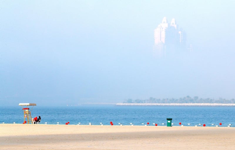 Abu Dhabi, United Arab Emirates, March 1, 2020.  Standalone:  The Fairmont Marina peeks through the fog on the Corniche, Abu Dhabi, on a sunny morning.Victor Besa / The NationalSection:  NAReporter:
