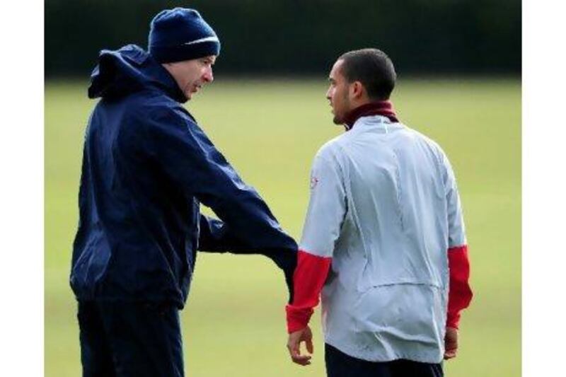 It remains to be seen whether Theo Walcott, right, will be regarded as a successful English signing for Arsene Wenger.