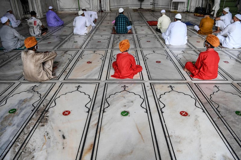 Muslims offer Friday prayers at Jama Masjid in New Delhi, India. AFP