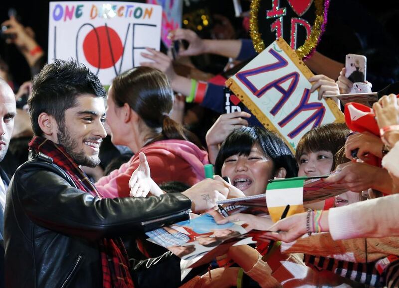 Readers are divided over news that Zayn Malik has officially left One Direction.  (AP Photo/Koji Sasahara, File)