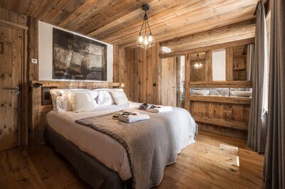 A cosy bedroom at Chalet Inoko. Photo: Purple Ski
