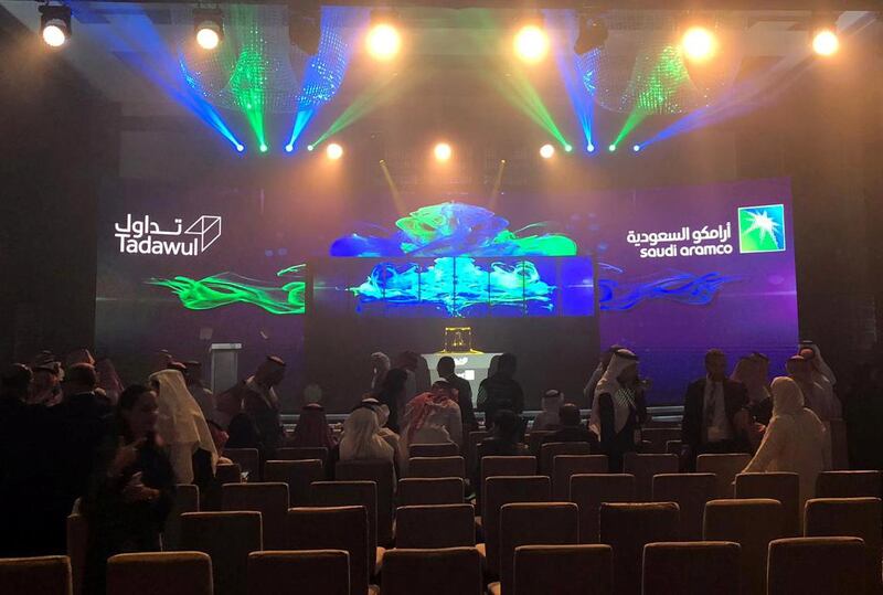 Participants attend the official ceremony marking the debut of Saudi Aramco's initial public offering (IPO) on the Riyadh's stock market, in Riyadh, Saudi Arabia. Reuters