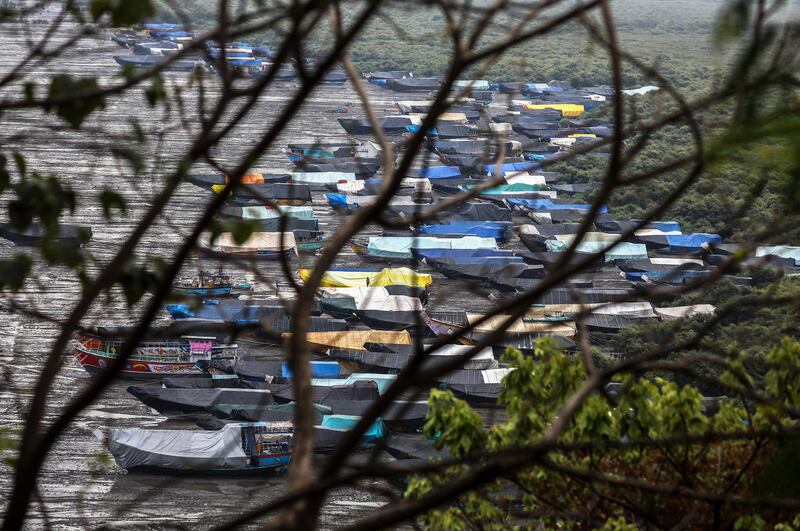 General view of Indian fishing boats covered with tarpaulins anchoring at the shore of the Arabian sea near Chowk Dongri at the village of Uttan, near Mumbai, India.  EPA