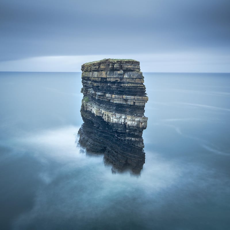 Dun Briste, a tower of layered rocks rising off the western coast of Ireland. Norman McCloskey