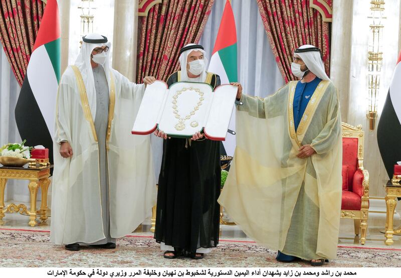 DUBAI, UNITED ARAB EMIRATES - February 09, 2021: HH Sheikh Mohamed bin Zayed Al Nahyan, Crown Prince of Abu Dhabi and Deputy Supreme Commander of the UAE Armed Forces (L) and HH Sheikh Mohamed bin Rashid Al Maktoum, Vice-President, Prime Minister of the UAE, Ruler of Dubai and Minister of Defence (R), presents a UAE Union Medal to HE Zaki Anwar Nusseibeh, UAE Minister of State (C), at Zabeel Palace.

( Handout )
---
