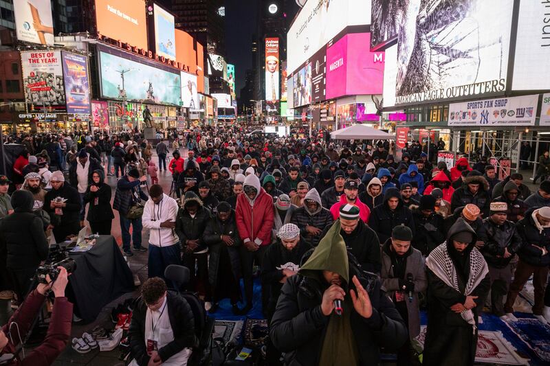 Muslims gather for taraweeh prayers in New York's Times Square. AP