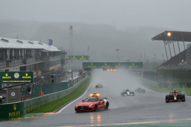 The safety car leads the field at the attempted restart in Belgium. Getty