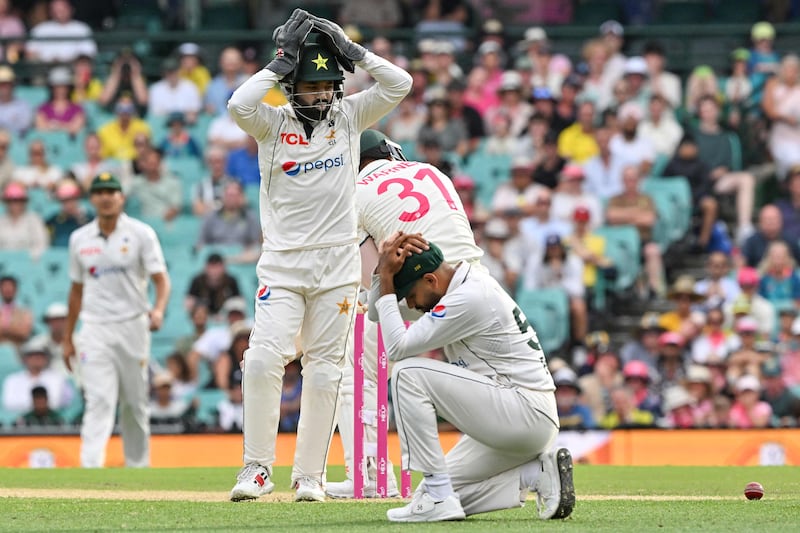 Pakistan’s wicketkeeper Mohammad Rizwan reacts as the ball nearly hits the stumps of Australia’s David Warner. AFP