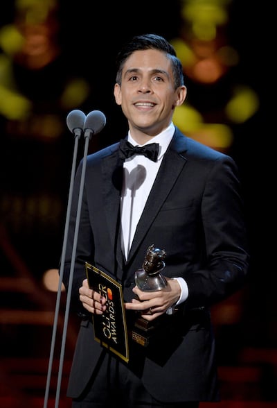 LONDON, ENGLAND - APRIL 07:  Matthew Lopez, accepting the Best New Play award for 'The Inheritance' on stage during The Olivier Awards 2019 with Mastercard at the Royal Albert Hall on April 07, 2019 in London, England. (Photo by Jeff Spicer/Getty Images)