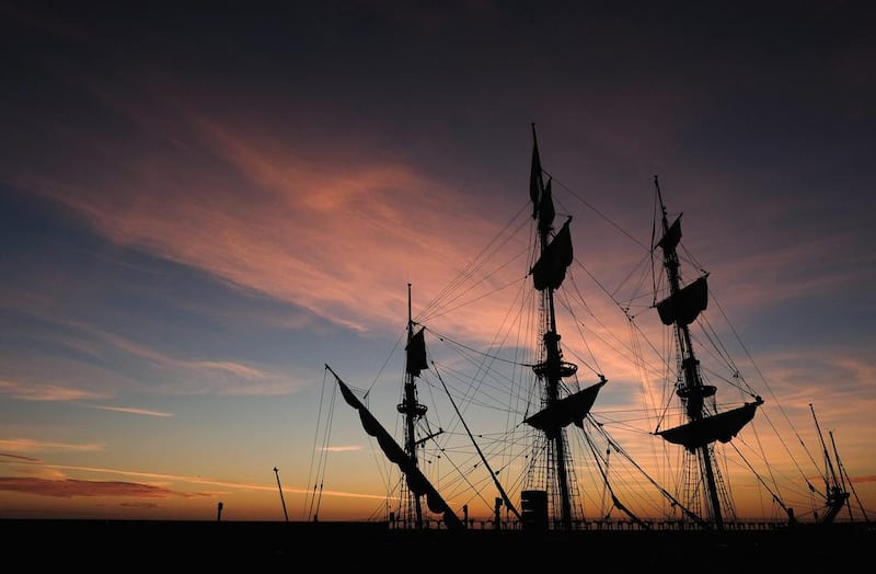 Masts and rigging are seen against the first light of dawn as ships are moored in the harbour during the North Sea Tall Ships Regatta in Blyth, England. Ian Forsyth  Getty Images