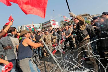 Street protests erupted in Beirut after Lebanese President Michel Aoun defended the role of Hezbollah in government. AFP