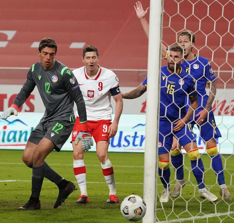 Poland's forward Robert Lewandowski watches a chance go wide of the target. AFP