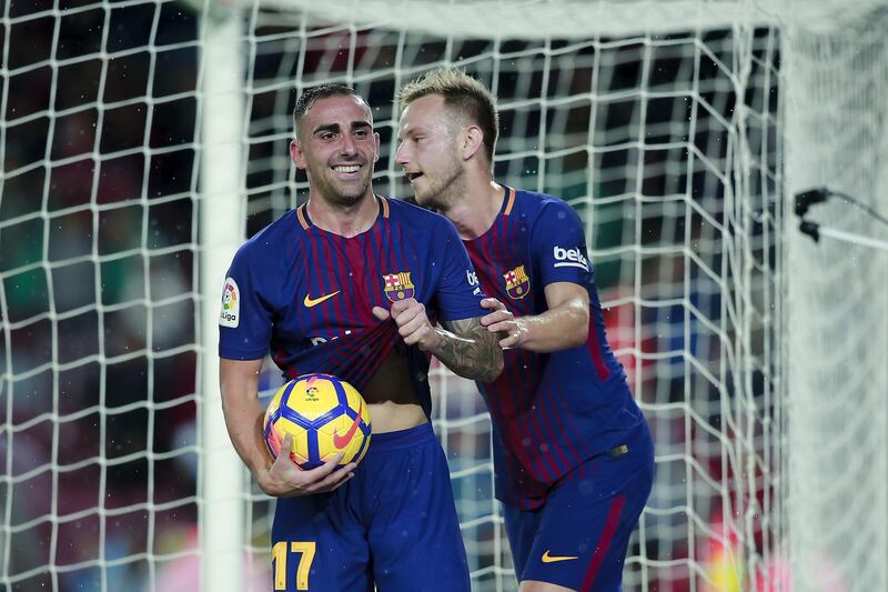 BARCELONA, SPAIN - NOVEMBER 04:  Paco Alcacer (R) of FC Barcelona celebrates scoring their opening goal with teammate Ivan Rakitic (L)during the La Liga match between FC Barcelona and Sevilla FC at Camp Nou stadium on November 4, 2017 in Barcelona, Spain.  (Photo by Gonzalo Arroyo Moreno/Getty Images)