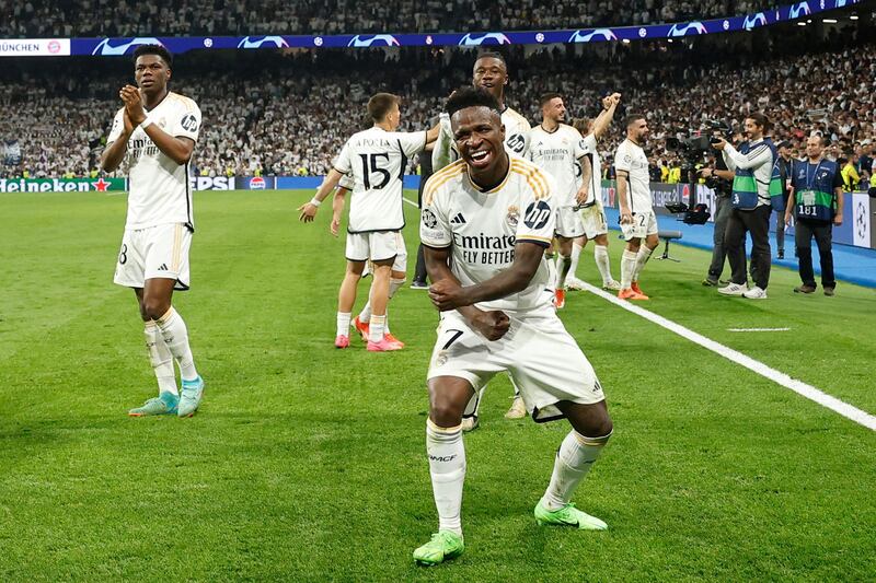 Vinicius Junior leads the celebrations after Real Madrid's victory over Bayern Munich in the Uefa Champions League semi-final at the Santiago Bernabeu in Madrid on May 8, 2024. AFP